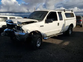 2003 Ford Super Duty F-250 XL with VIN 1FTNX21L83EB37779, listed as a Copart auction lot 77220014 with 160,011 mi miles and Salvage Title. Bid and sale history available at carsss.com. Image 1.