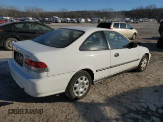 1999 Honda Civic DX with VIN 1HGEJ6120XL031958, listed as a Copart auction lot 42166565 with 69,457 mi miles and Clean Title. Bid and sale history available at carsss.com. Image 3.