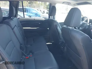 2021 Honda Pilot EX-L with VIN 5FNYF6H59MB016354, listed as a IAAI auction lot 42108020 with 61,436 mi miles and . Bid and sale history available at DreamBid. Image 8.