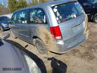 2015 Dodge Grand Caravan SE with VIN 2C4RDGBG4FR530064, listed as a IAAI auction lot 41443100 with 125,098 mi miles. Bid and sale history available at carsss.com. Image 3.
