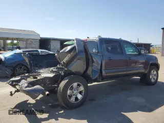 2015 Toyota Tacoma with VIN 3TMMU4FN7FM078006, listed as a Copart auction lot 59129495 with 244,062 mi miles and Salvage title. Bid and sale history available at DreamBid. Image 3.
