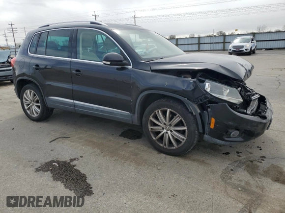 2012 Volkswagen Tiguan SE with VIN WVGAV7AX2CW535869, listed as a Copart auction lot 50589445 with 114,978 mi miles and Salvage Title. Bid and sale history available at DreamBid. Image 4.