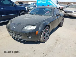 2006 Mazda MX-5 Miata Sport with VIN JM1NC25F860115878, listed as a IAAI auction lot 42842757 with 81,777 mi miles and . Bid and sale history available at DreamBid. Image 2.