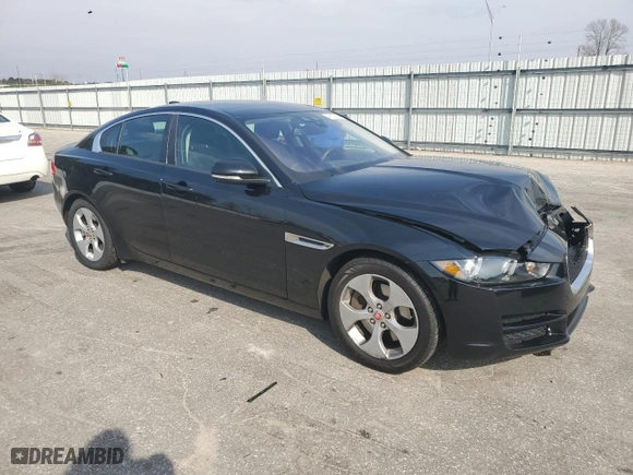 2017 Jaguar XE 25t with VIN SAJAR4BGXHA965404, listed as a Copart auction lot 49105855 with 76,990 mi miles and Salvage Title. Bid and sale history available at carsss.com. Image 4.