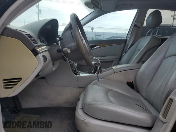 2003 Mercedes-Benz E 500 z VIN WDBUF70J63A290744, wystawiony jako Copart lot #58621995 z przebiegiem 124 631 mil mil oraz Czysty tytuł • Clean title. Historia ofert i sprzedaży dostępna na DreamBid. Obrazek 7.