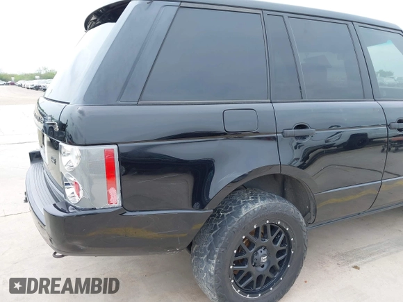 2006 Land Rover Range Rover HSE with VIN SALME15486A235049, listed as a IAAI auction lot 41948648 with 211,154 mi miles. Bid and sale history available at carsss.com. Image 17.