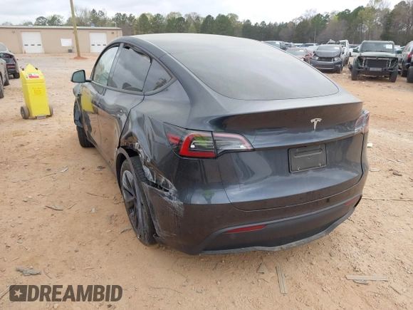 2024 Tesla Model Y with VIN 7SAYGDED3RA303113, listed as a IAAI auction lot 41915760 with 12,917 mi miles and . Bid and sale history available at DreamBid. Image 3.
