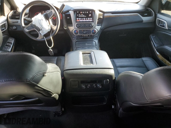 2016 GMC Yukon Denali with VIN 1GKS1CKJXGR329103, listed as a Copart auction lot 75492494 with 124,374 mi miles and Salvage Title. Bid and sale history available at carsss.com. Image 8.