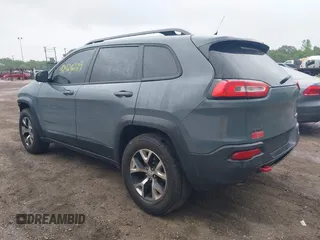 2014 Jeep Cherokee Trailhawk with VIN 1C4PJMBB5EW156315, listed as a IAAI auction lot 42426229 with 154,019 mi miles and . Bid and sale history available at DreamBid. Image 3.