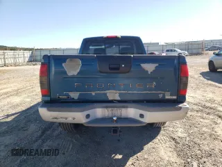 2003 Nissan Frontier XE with VIN 1N6ED26Y93C468148, listed as a Copart auction lot 76468404 with 178,257 mi miles and Salvage title. Bid and sale history available at DreamBid. Image 6.