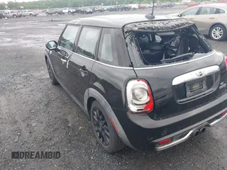 2015 MINI Hardtop 4 Door S with VIN WMWXU3C55F2B56429, listed as a IAAI auction lot 42335996 with 114,781 mi miles and . Bid and sale history available at DreamBid. Image 3.