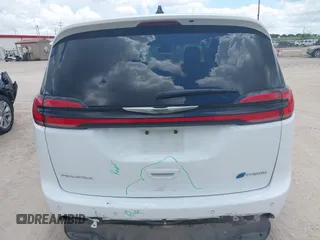 2023 Chrysler Pacifica Hybrid Touring L with VIN 2C4RC1L71PR622474, listed as a IAAI auction lot 42595061 with 55,880 mi miles and . Bid and sale history available at DreamBid. Image 16.