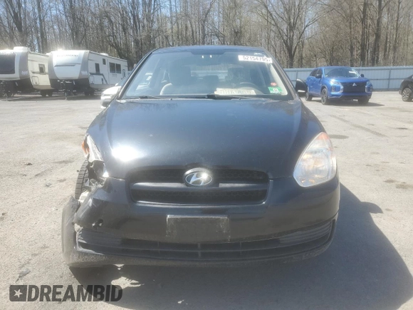 2011 Hyundai Accent GS z VIN KMHCM3AC6BU198599, wystawiony jako Copart lot #52154795 z przebiegiem 116 842 mil mil oraz Szkoda całkowita • Salvage title. Historia ofert i sprzedaży dostępna na DreamBid. Obrazek 5.