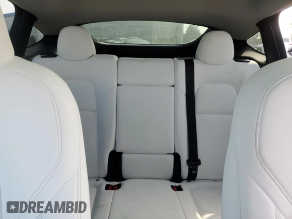 2024 Tesla Model Y Long Range with VIN 7SAYGDEE1RA266653, listed as a Copart auction lot 62277865 with 8,189 mi miles and Salvage title. Bid and sale history available at DreamBid. Image 10.