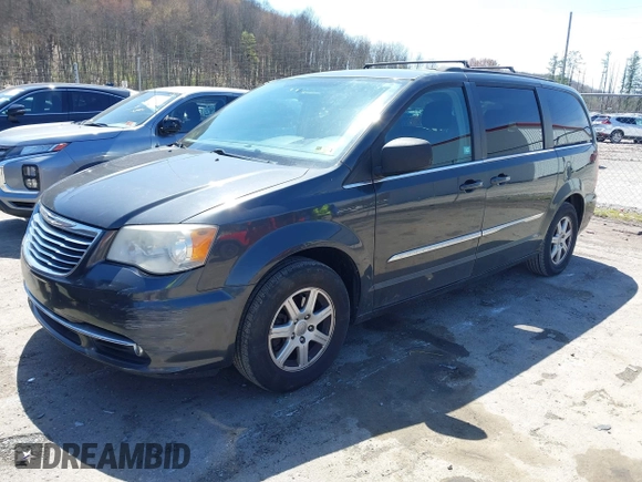 2012 Chrysler Town & Country Touring with VIN 2C4RC1BG9CR313105, listed as a IAAI auction lot 41971919 with 165,986 mi miles. Bid and sale history available at carsss.com. Image 2.