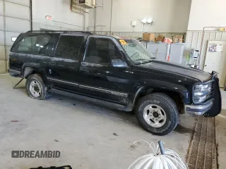 1999 Chevrolet Suburban with VIN 1GNGK26J6XJ444189, listed as a Copart auction lot 68249474 with 216,412 mi miles and Salvage Title. Bid and sale history available at carsss.com. Image 4.