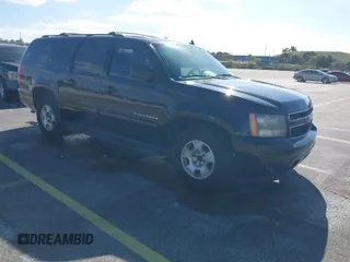 2011 Chevrolet Suburban LS with VIN 1GNSCHE04BR284777, listed as a IAAI auction lot 41291991 with 285,187 mi miles. Bid and sale history available at carsss.com. Image 1.