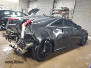 2014 Cadillac CTS Performance z VIN 1G6DG1E37E0103321, wystawiony jako Copart lot #52013005 z przebiegiem 70 394 mil mil oraz Szkody całkowita. Historia ofert i sprzedaży dostępna na DreamBid. Obrazek 3.