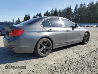 2013 BMW 3 Series 328i xDrive with VIN WBA3B3C56DF530814, listed as a Copart auction lot 52820915 with 144,164 mi miles and Salvage Title. Bid and sale history available at carsss.com. Image 3.