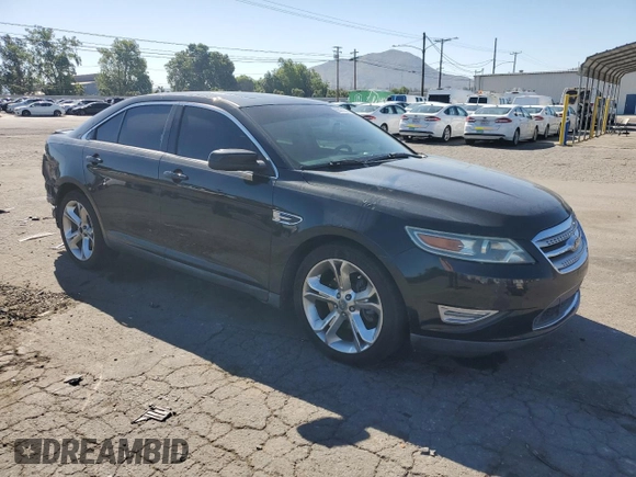 2011 Ford Taurus SHO with VIN 1FAHP2KT2BG114440, listed as a Copart auction lot 56431635 with 126,484 mi miles and Salvage title. Bid and sale history available at DreamBid. Image 4.
