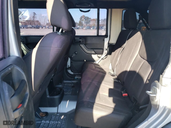 2013 Jeep Wrangler Unlimited Sport with VIN 1C4BJWDG7DL688230, listed as a Copart auction lot 48744865 with 142,110 mi miles and Clean Title. Bid and sale history available at carsss.com. Image 10.