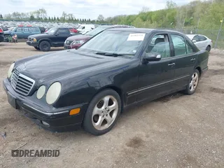 2002 Mercedes-Benz E-Class with VIN WDBJF65J52B496832, listed as a IAAI auction lot 42202331 with 156,304 mi miles. Bid and sale history available at carsss.com. Image 2.