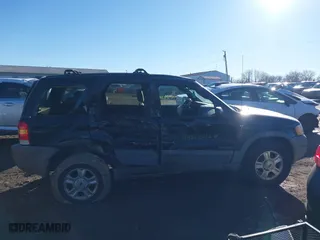 2002 Ford Escape XLT Choice with VIN 1FMYU04172KD87546, listed as a IAAI auction lot 41452834 with 241,707 mi miles. Bid and sale history available at carsss.com. Image 13.