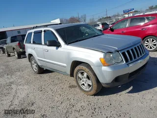 2010 Jeep Grand Cherokee Laredo with VIN 1J4PS4GKXAC103153, listed as a IAAI auction lot 41760743 with 185,138 mi miles. Bid and sale history available at carsss.com. Image 1.