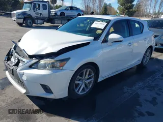 2014 Lexus CT 200h with VIN JTHKD5BH5E2203604, listed as a IAAI auction lot 41372030 with 147,449 mi miles and . Bid and sale history available at DreamBid. Image 18.