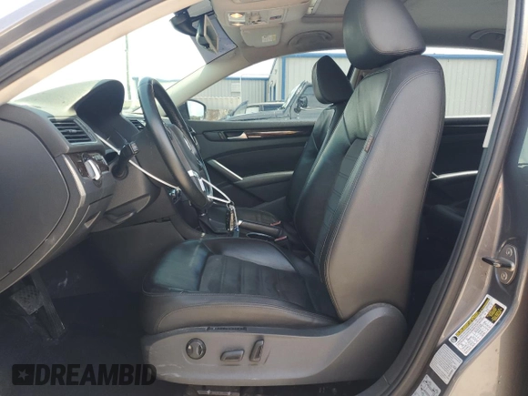 2015 Volkswagen Passat SEL Premium with VIN 1VWCV7A36FC007670, listed as a Copart auction lot 60208065 with 143,703 mi miles and Salvage title. Bid and sale history available at DreamBid. Image 7.