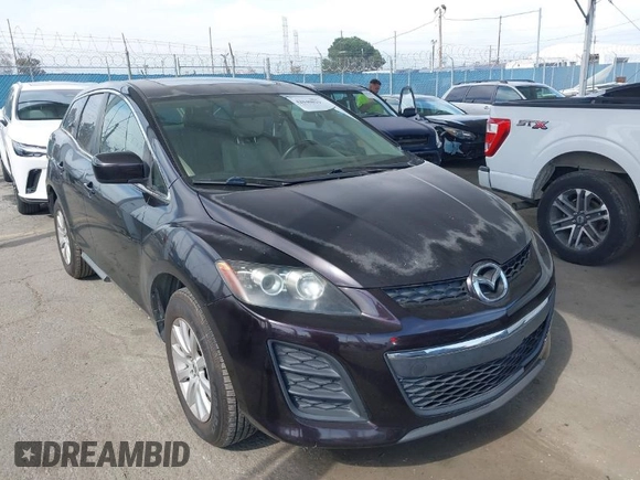 2011 Mazda CX-7 i Touring with VIN JM3ER2CM0B0402889, listed as a IAAI auction lot 42040829 with 134,836 mi miles. Bid and sale history available at carsss.com. Image 1.