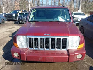 2007 Jeep Commander Sport z VIN 1J8HG48P37C573256, wystawiony jako IAAI lot #41448883 z przebiegiem 146 581 mil mil oraz . Historia ofert i sprzedaży dostępna na DreamBid. Obrazek 12.