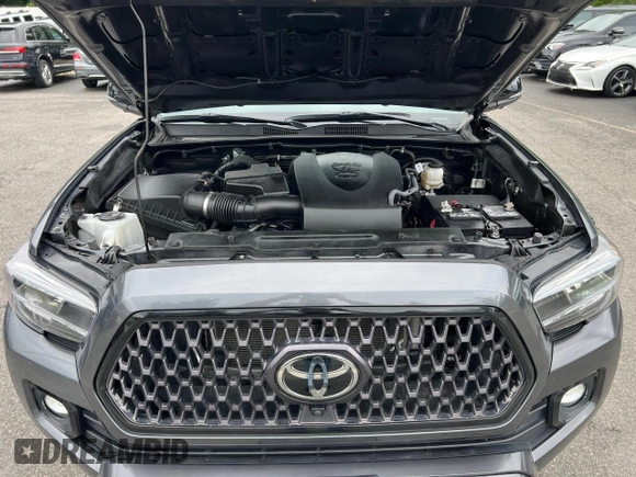 2022 Toyota Tacoma Limited with VIN 3TMGZ5AN7NM458988, listed as a Copart auction lot 65398105 with 32,115 mi miles and Salvage title. Bid and sale history available at DreamBid. Image 8.