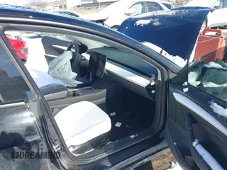2023 Tesla Model 3 Performance with VIN 5YJ3E1EC7PF423161, listed as a IAAI auction lot 41566987 with 22,111 mi miles. Bid and sale history available at carsss.com. Image 5.