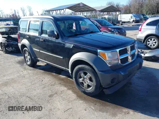 2007 Dodge Nitro SXT z VIN 1D8GU28K67W529143, wystawiony jako IAAI lot #41833069 z przebiegiem 210 337 mil mil oraz . Historia ofert i sprzedaży dostępna na DreamBid. Obrazek 1.