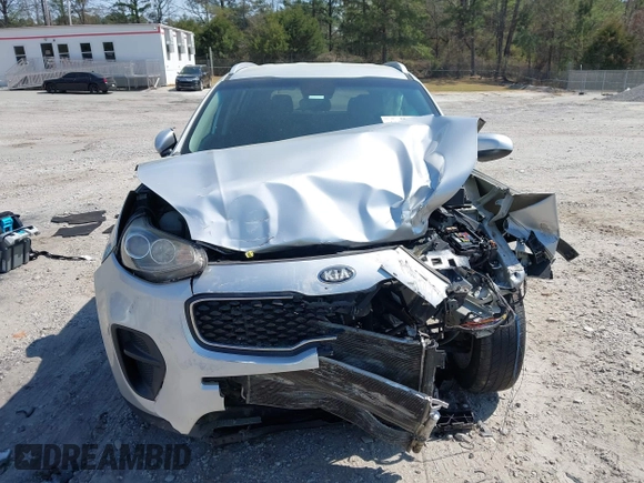 2018 Kia Sportage LX with VIN KNDPM3AC6J7422408, listed as a IAAI auction lot 41918342 with 104,385 mi miles and . Bid and sale history available at carsss.com. Image 13.