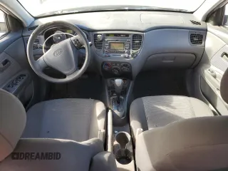 2009 Kia Rio LX with VIN KNADE223396477003, listed as a Copart auction lot 44943675 with 174,791 mi miles and Salvage Title. Bid and sale history available at carsss.com. Image 8.