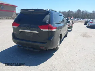 2011 Toyota Sienna XLE with VIN 5TDDK3DC8BS011975, listed as a IAAI auction lot 42112522 with 124,251 mi miles. Bid and sale history available at carsss.com. Image 4.