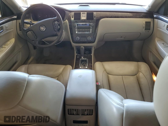 2010 Cadillac DTS 1SC z VIN 1G6KD5EYXAU119017, wystawiony jako Copart lot #56149775 z przebiegiem 113 617 mil mil oraz Szkoda całkowita • Salvage title. Historia ofert i sprzedaży dostępna na DreamBid. Obrazek 8.