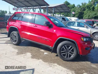 2021 Jeep Grand Cherokee Trailhawk with VIN 1C4RJFLG8MC549403, listed as a IAAI auction lot 42538177 with 33,124 mi miles and . Bid and sale history available at DreamBid. Image 1.