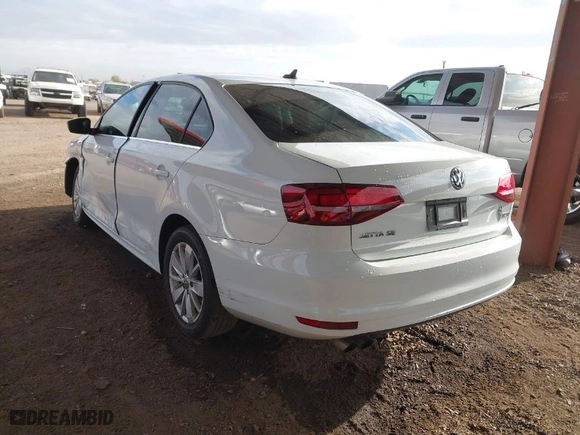 2016 Volkswagen Jetta Sedan 1.4T SE w/Connectivity with VIN 3VWD67AJ9GM360727, listed as a IAAI auction lot 41430367 with 124,993 mi miles. Bid and sale history available at carsss.com. Image 3.