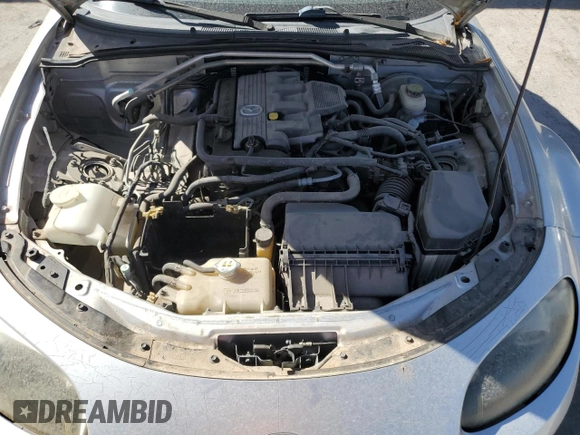 2007 Mazda MX-5 Miata Sport with VIN JM1NC25F470128936, listed as a Copart auction lot 45424585 with 123,910 mi miles and Salvage title. Bid and sale history available at DreamBid. Image 11.