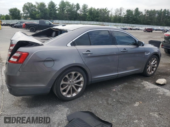 2014 Ford Taurus Limited with VIN 1FAHP2F88EG102674, listed as a Copart auction lot 62841285 with 107,378 mi miles and Salvage title. Bid and sale history available at DreamBid. Image 3.