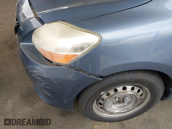 2009 Toyota Yaris with VIN JTDBT903791302911, listed as a IAAI auction lot 42181264 with 183,321 mi miles. Bid and sale history available at carsss.com. Image 15.