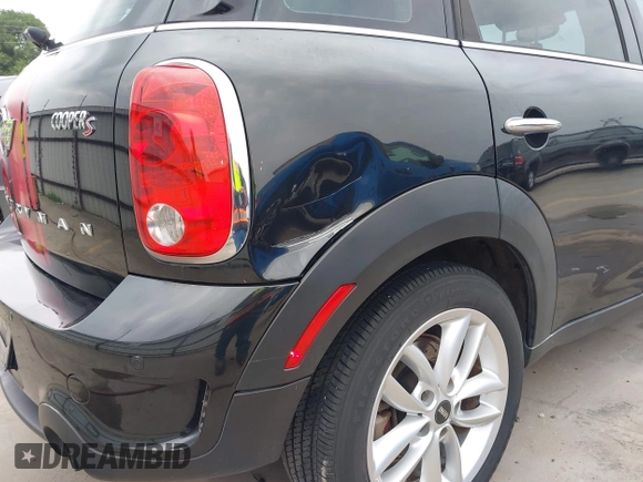 2014 MINI Countryman S z VIN WMWZC3C58EWT01074, wystawiony jako IAAI lot #42238095 z przebiegiem 83 252 mil mil oraz . Historia ofert i sprzedaży dostępna na DreamBid. Obrazek 6.