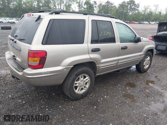 2004 Jeep Grand Cherokee Laredo with VIN 1J4GW48N24C230058, listed as a IAAI auction lot 42386914 with Not provided miles and . Bid and sale history available at DreamBid. Image 4.
