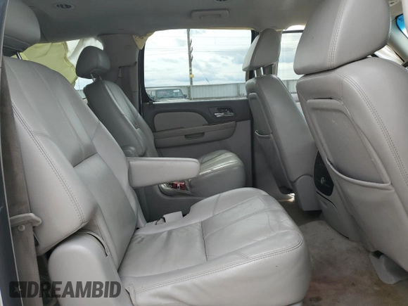 2007 GMC Yukon XL SLT z VIN 1GKFK16327J355384, wystawiony jako Copart lot #52161335 z przebiegiem 127 368 mil mil oraz Szkoda całkowita • Salvage title. Historia ofert i sprzedaży dostępna na DreamBid. Obrazek 12.