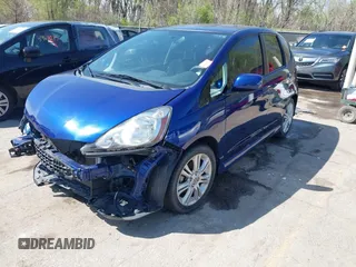 2010 Honda Fit Sport with VIN JHMGE8H4XAS018807, listed as a IAAI auction lot 41990369 with 63,151 mi miles. Bid and sale history available at carsss.com. Image 18.