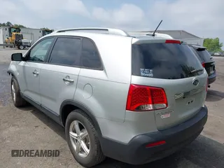 2013 Kia Sorento LX with VIN 5XYKT4A20DG360991, listed as a IAAI auction lot 42258999 with 129,278 mi miles and . Bid and sale history available at DreamBid. Image 3.