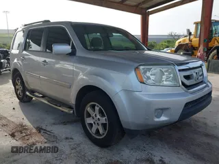 2009 Honda Pilot Touring z VIN 5FNYF38839B022943, wystawiony jako IAAI lot #42443006 z przebiegiem 199 184 mil mil oraz . Historia ofert i sprzedaży dostępna na DreamBid. Obrazek 1.